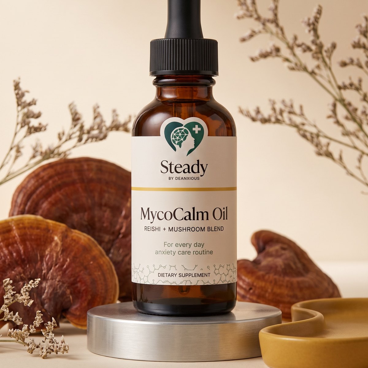 MycoCalm Oil on a brushed aluminium stand between reishi mushrooms and dried botanicals, in warm morning light.